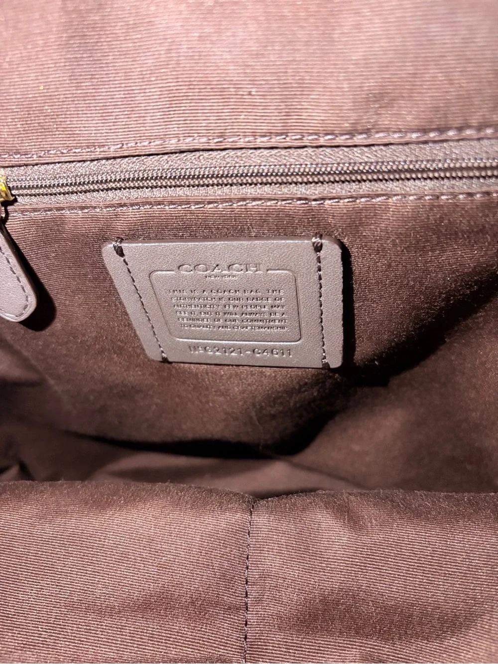 Coach Outlet Signature Canvas Drawstring Backpack in Brown/Tan, Gently Used.